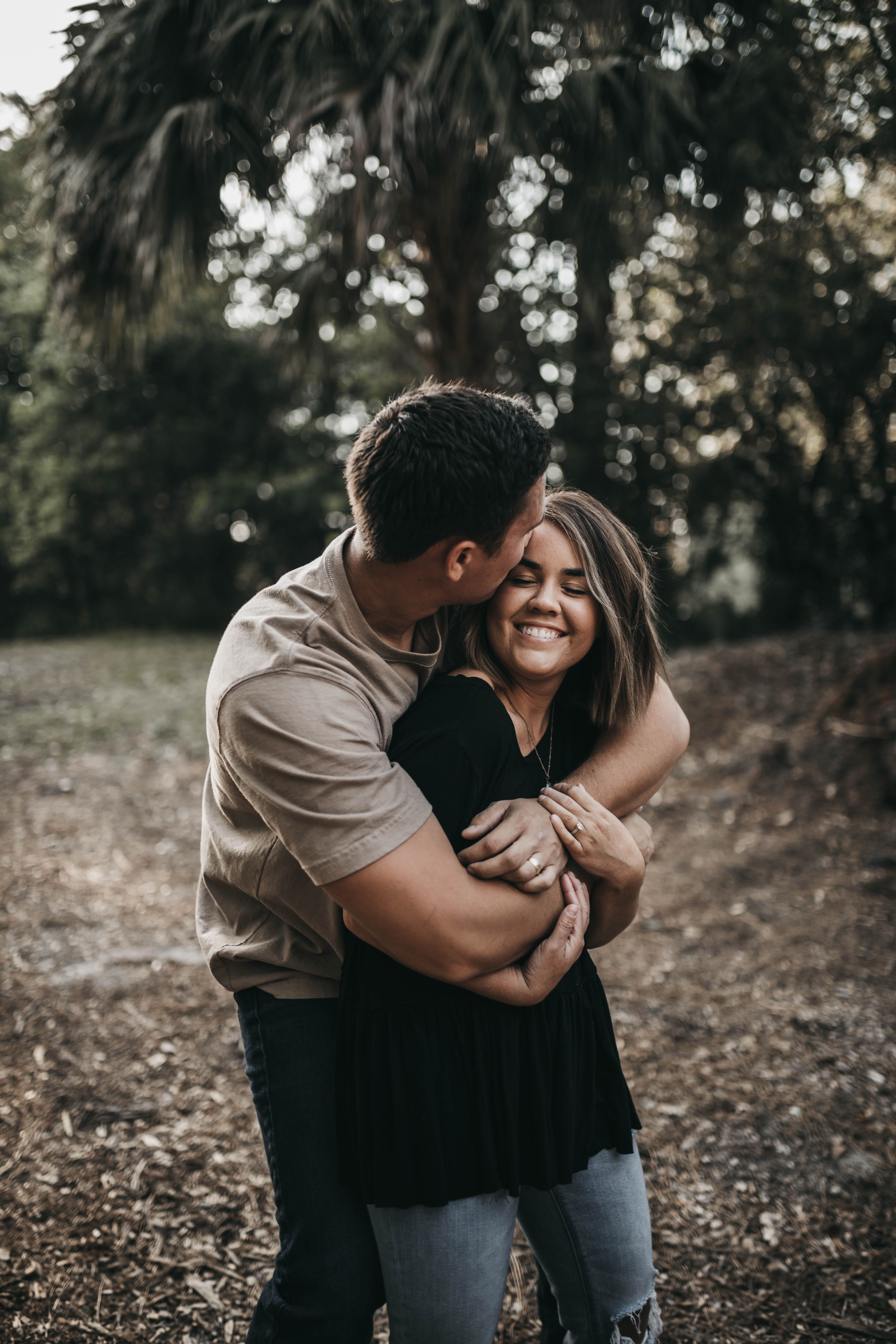 Full length portrait of a casual young couple posing isolated on white  background Stock Photo - Alamy