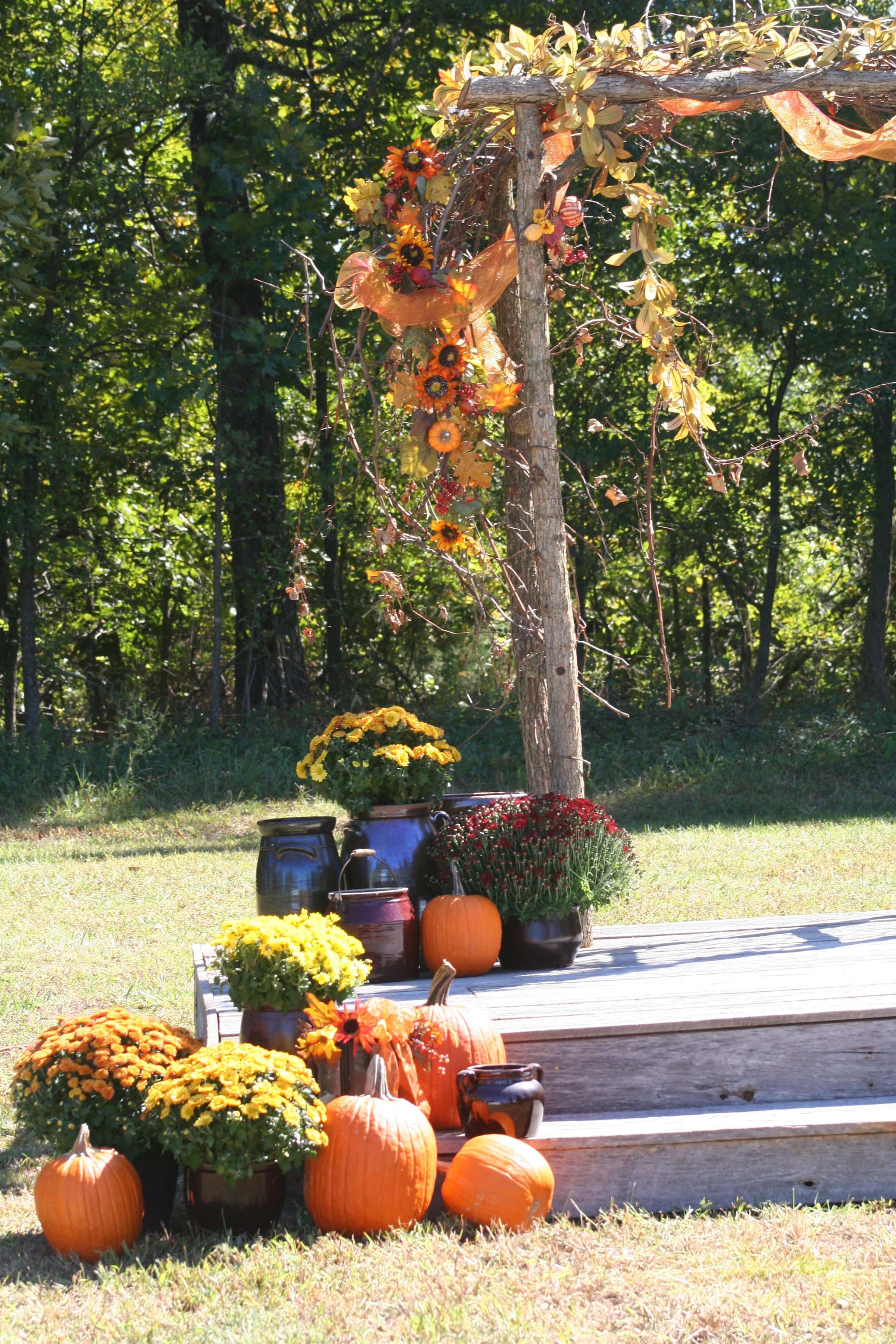 Rustic Country Fall Wedding Arch Decorated With Sunflowers Grapevines Orange Tulle Crocks Rustic Country Fall Wedding Arch Decorated With Sunflowers Grapevines Orange Tulle Crocks