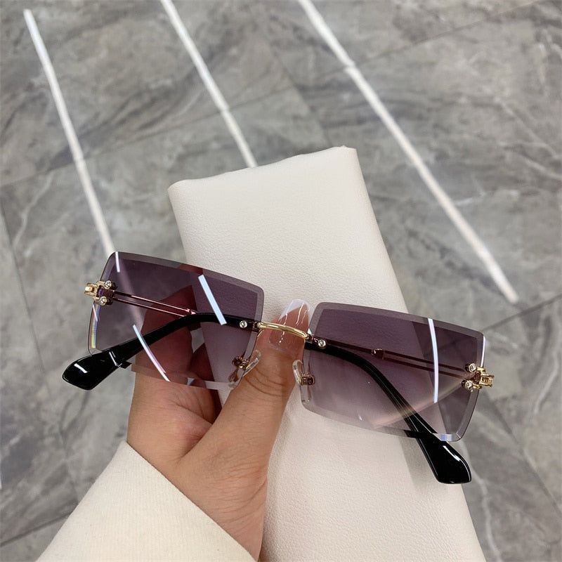 SPECIFICATIONSStyle: RimlessOrigin: CN(Origin)Model Number: 129Lenses Optical Attribute: UV400Lenses Material: PolycarbonateLens Width: 60mmLens Height: 52mmItem Type: EyewearGender: WOMENFrame Material: AlloyEyewear Type: SunglassesDepartment Name: AdultBrand Name: KAMMPT Stylish Sunglasses, Gold Sunglasses, Sunglasses Women, Sunnies, Vintage Mode, Moda Vintage, Retro Fashion, Vintage Fashion, Style Fashion