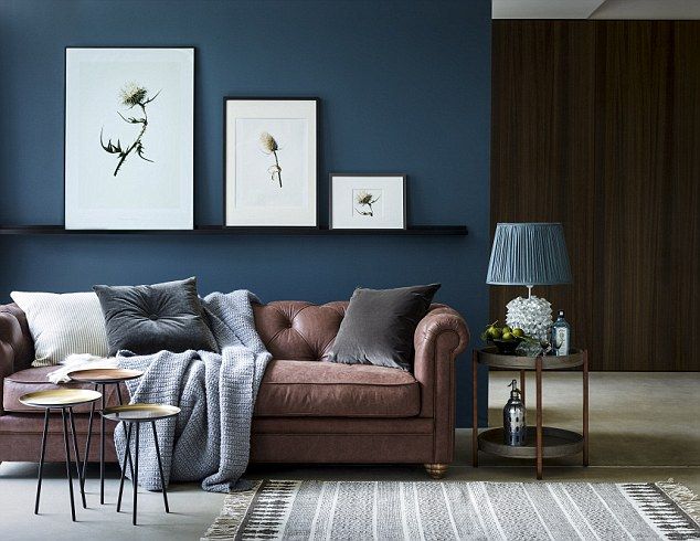 Don T Go To War Over The Decor Find A Compromise To Suit You Both Brown And Blue Living Room Dark Blue Living Room Brown Couch Living Room