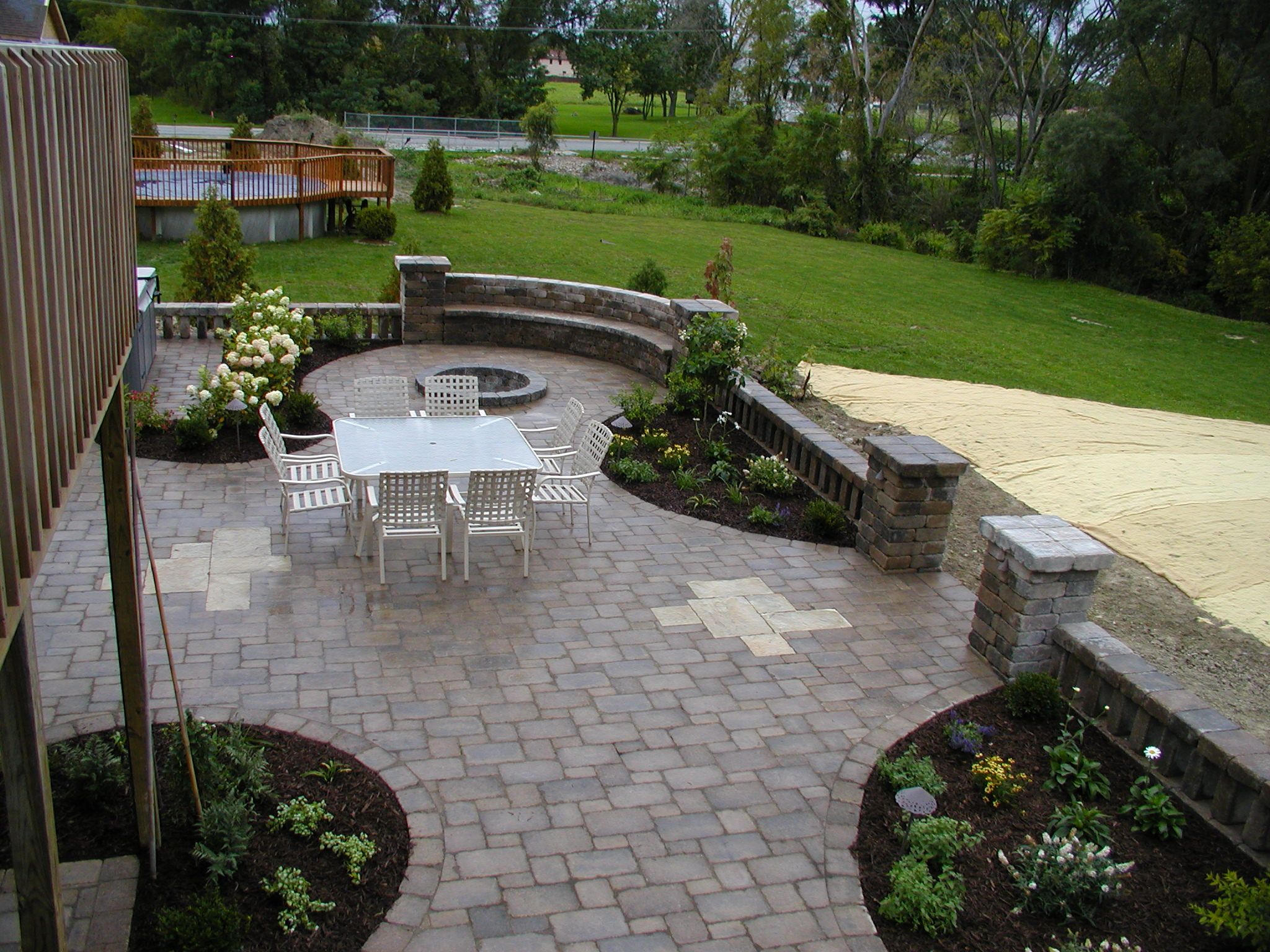 Hardscapes Patio with fire pit seat wall and planting beds