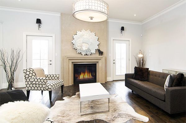 20 Living Rooms Adorned With Cowhide Rugs Rugs In Living Room Brown Living Room Decor Eclectic Living Room