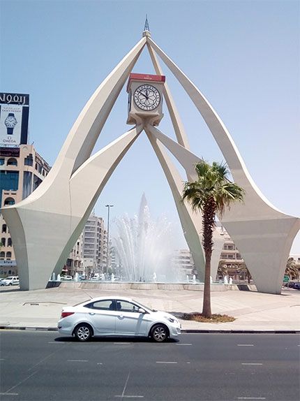 Dubai Clock Tower Is A Beautiful Round About In Dubai its Located Near dubai-clock-tower-is-a-beautiful-round-about-in-dubai-its-located-near