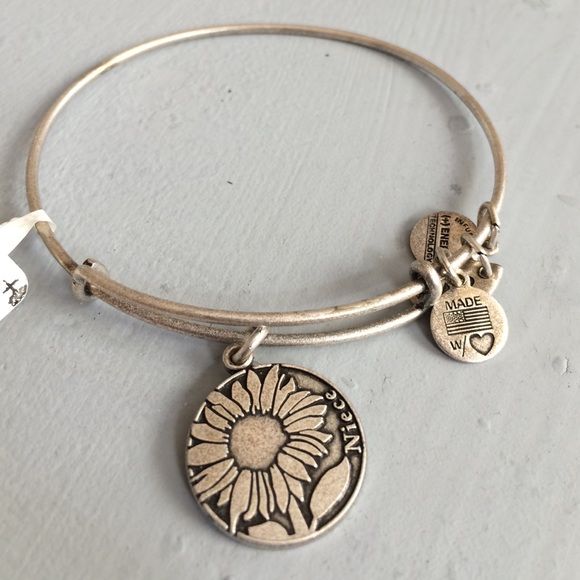Alex And Ani Sunflower Niece Bracelet My Posh Closet Pinterest Alex And Ani Sunflower Niece Bracelet With A Charm That Says Jewelry Bracelets