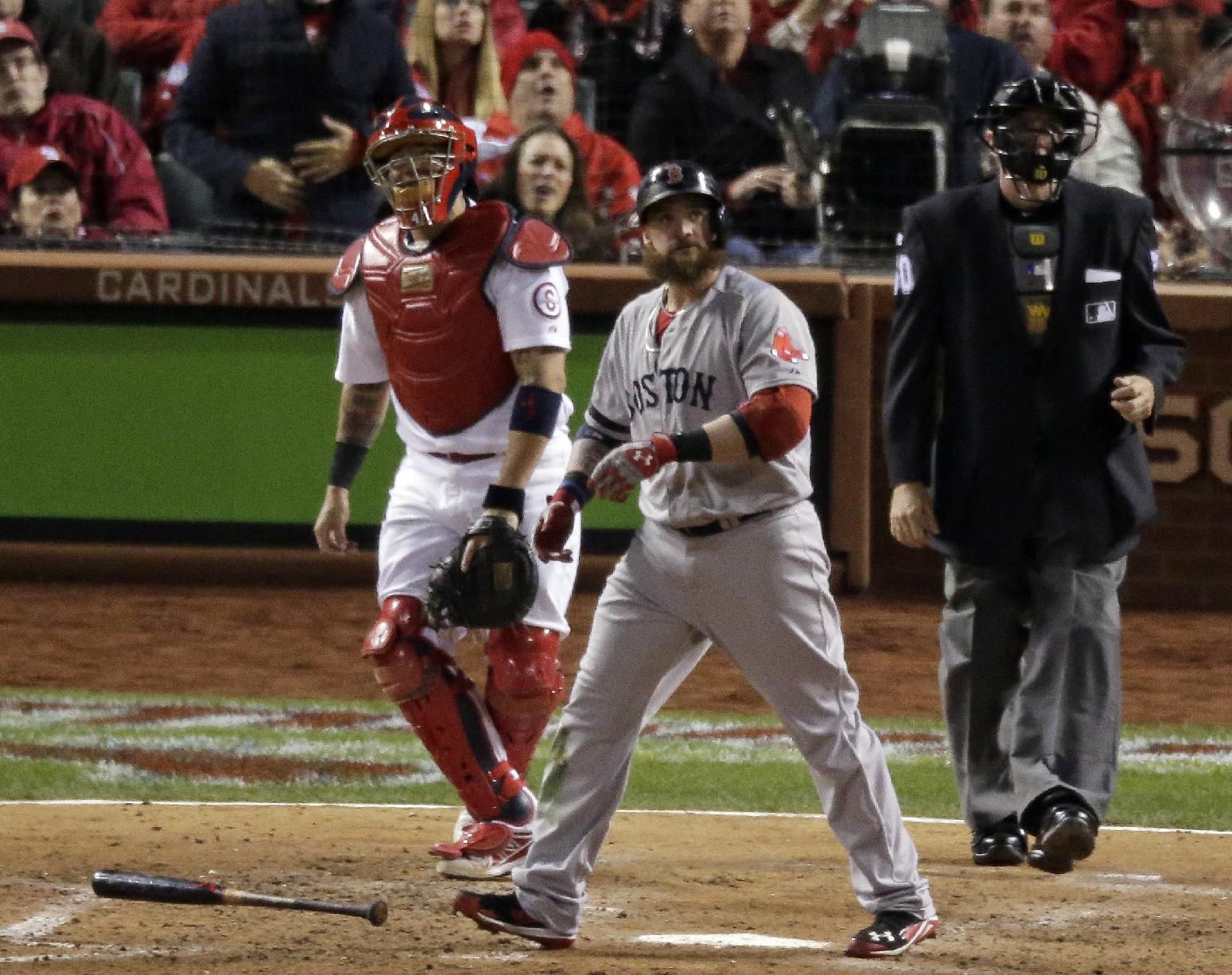 Boston Red Sox's Jonny Gomes watches his threerun home run during the