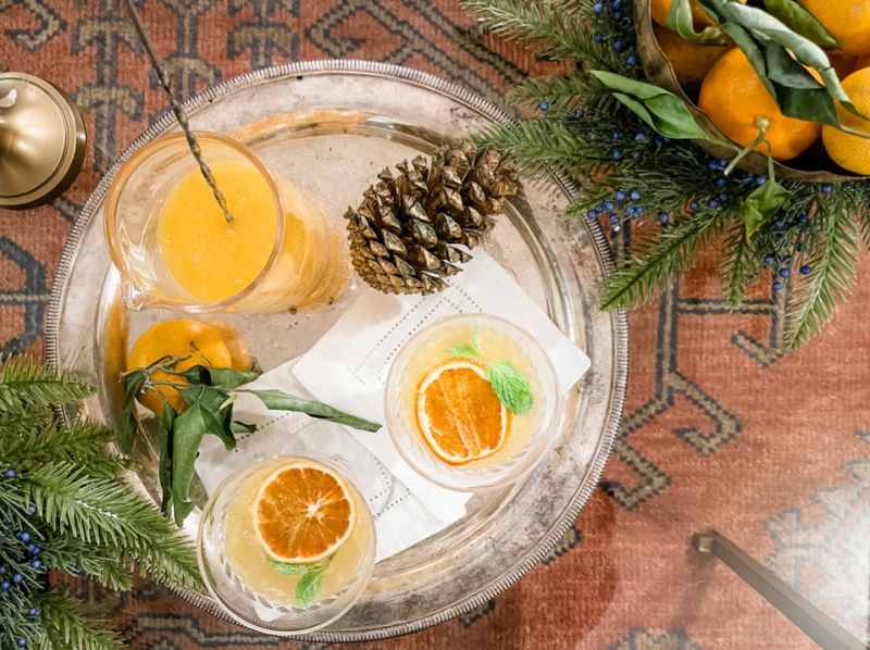 Cara Cara Orange Winter Spritz on silver tray. Dried Orange Slices, Dried Oranges, Midnight Toast, Cranberry Bread Recipes, Hand Juicer, Beverage Fridge, Winter Cocktails, Persimmons, Holiday Gathering