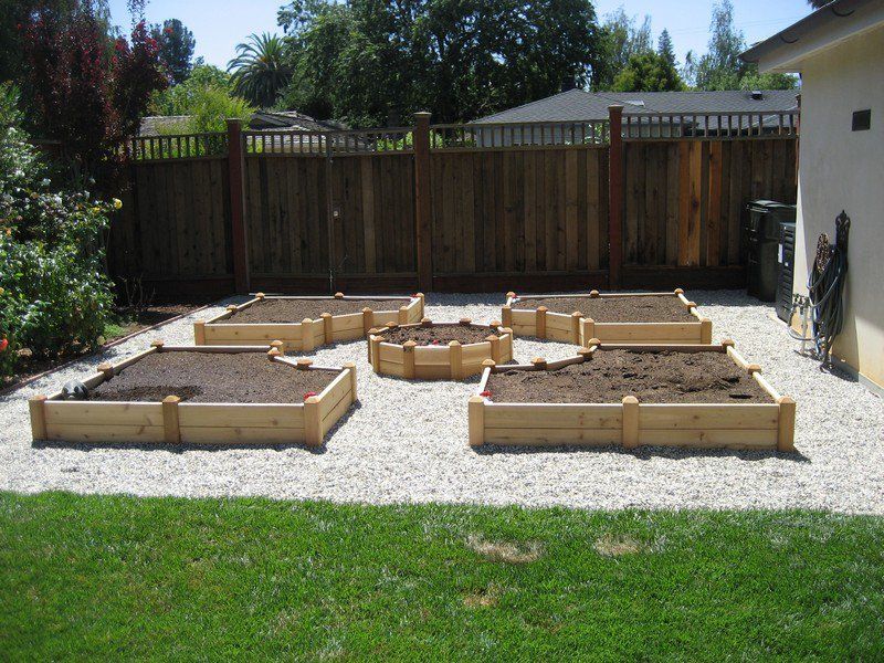 raised garden beds are easy on your back and will give your plants good drainage and generally better soil quality by building this u shaped garden bed