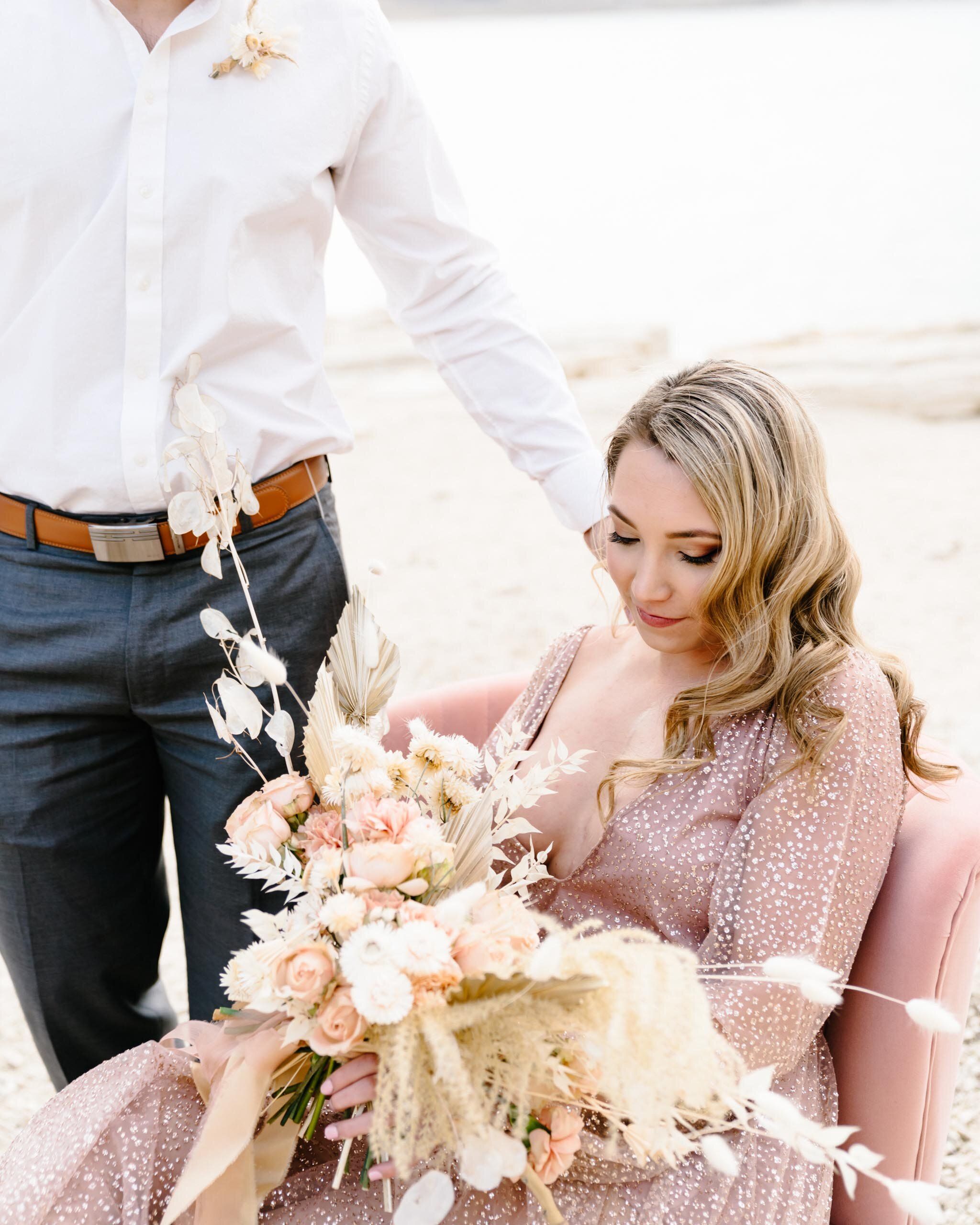 A gorgeous mountain elopement wedding in Cody, Wyoming with a neutral and dusty pink color palette. The bride has a boho bouquet with a mixture of dried flowers in her dried flower bouquet. Photo: Kayleigh Rust #bohoweddingflowers #bohowedding #mountainelopement #driedweddingflowers Bohemian Wedding Flowers Bouquet, Wildflower Wedding Bouquet, Spring Wedding Bouquets, Boho Bouquet, Wedding Flowers Summer, Boho Outdoor Wedding, Boho Wedding Ceremony, Elopement Wedding, Elope Wedding