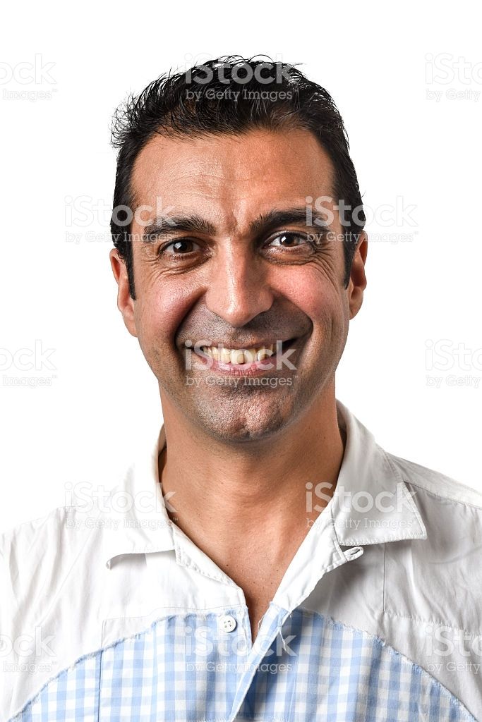 Headshot Of A Hispanic Or Middle Eastern Mid Adult Man Looking At