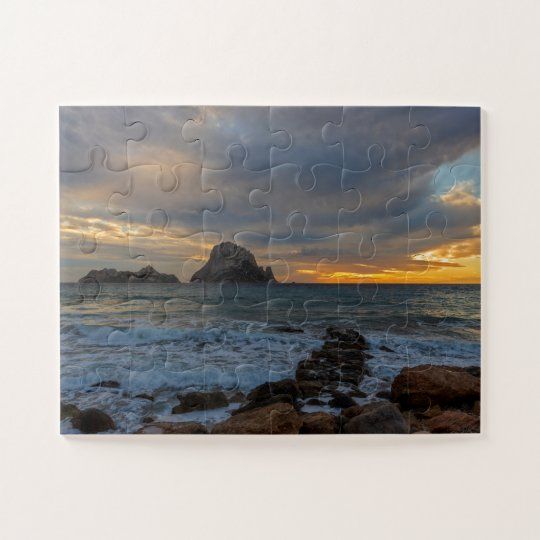 Puzzles con fotografías de paisajes de Es Vedra en Ibiza Puzzle de un atardecer nublado desde Cala D´Hort con Es Vedra