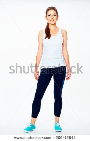 Fitness Woman In Sport Style Standing Against White Background