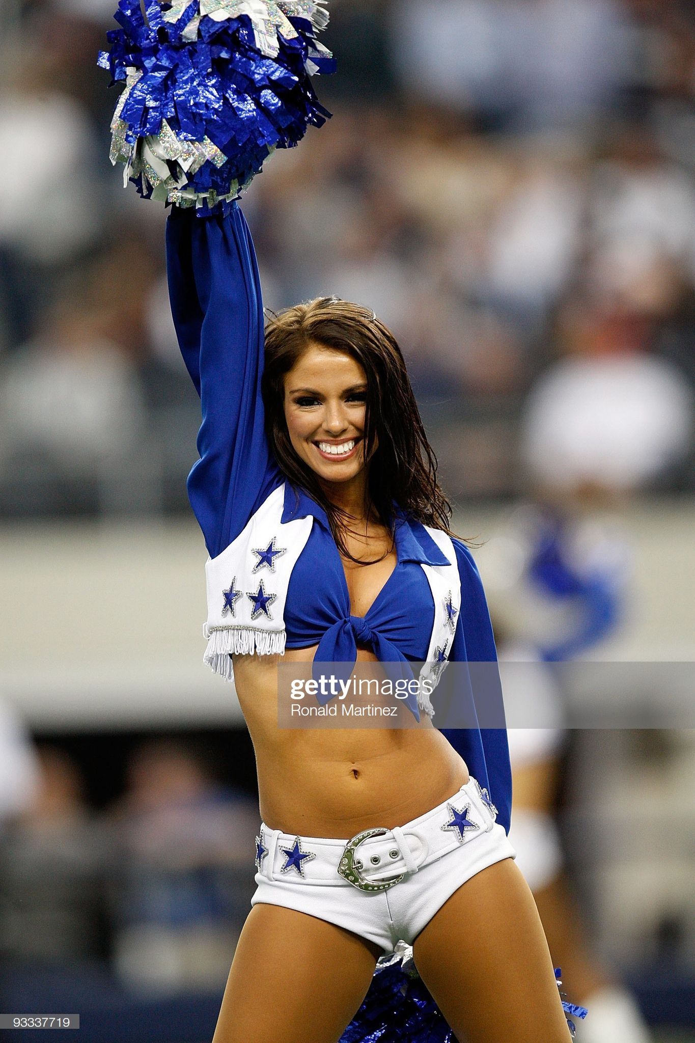 Amy Reese of the Dallas Cowboys Cheerleaders performs at Cowboys