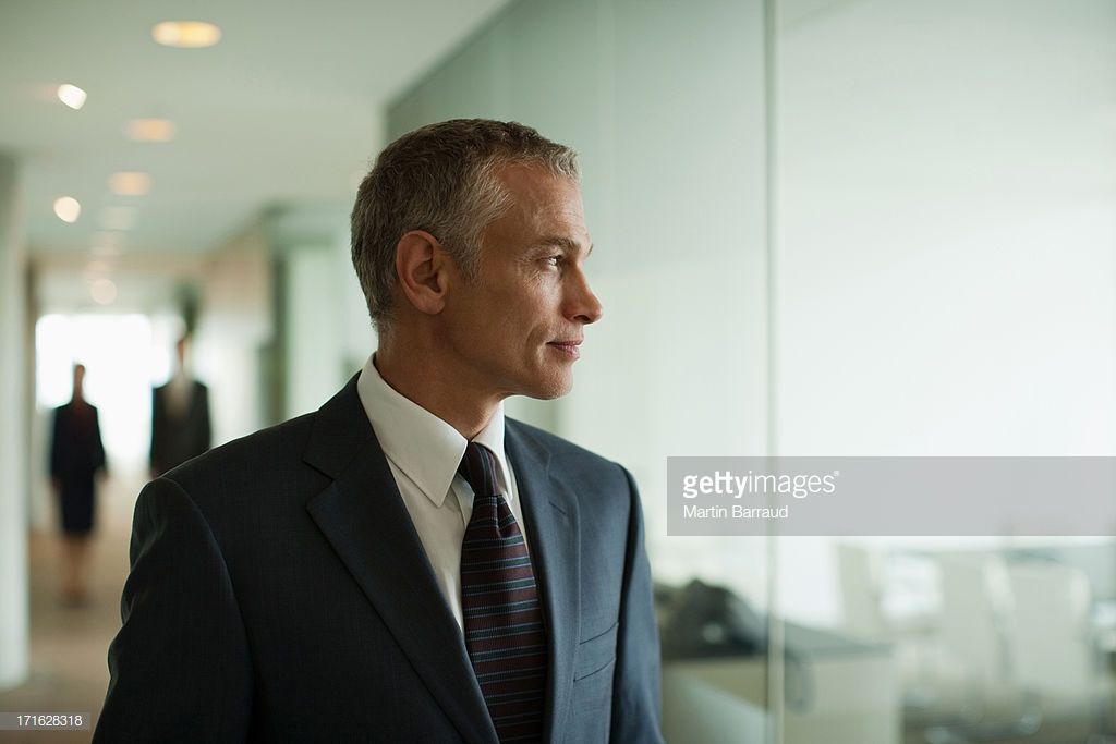 Businessman Standing In Busy Office Image Stock Photos Photography