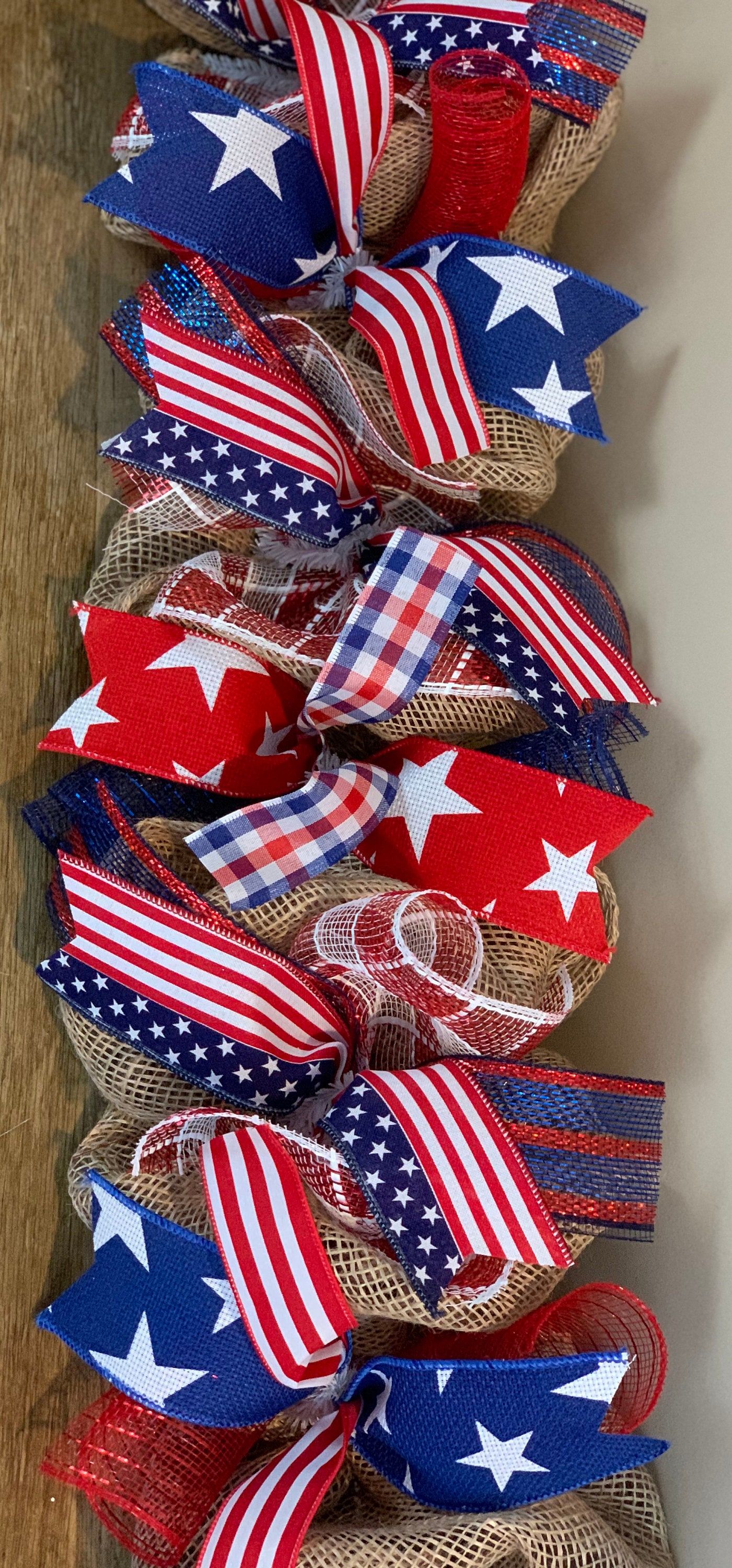 Looking for the perfect Patriotic decorations to accent your mantle, TV stand, mirror or door? This garland is sure to add the perfect touch. This garland is available in several lengths. Be sure to check out all my other listings at: https://Wreath4everyseason.etsy.com Or https://www.etsy.com/shop/Wreath4everyseason **purchase any item and receive a 10% off coupon good towards your next purchase Patriotic garland, summer garland, Memorial Day decor, Fourth of July garland, red white and blue ga Patriotic Mantle Decor, Patriotic Garland, Patriotic Flowers, Summer Mantle Decor, Patriotic Crafts, July 4th Holiday, Fourth Of July Decor, 4th Of July Wreaths, Labor Day Decorations