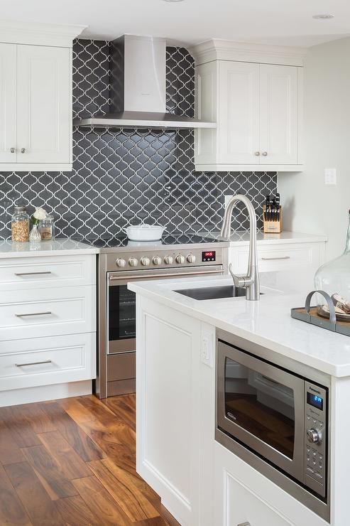 Under Counter Microwave Is Built Into A White Marble Countertop Under Counter Microwave Is Built Into A White Marble Countertop Center Island Surrounded By Stainless
