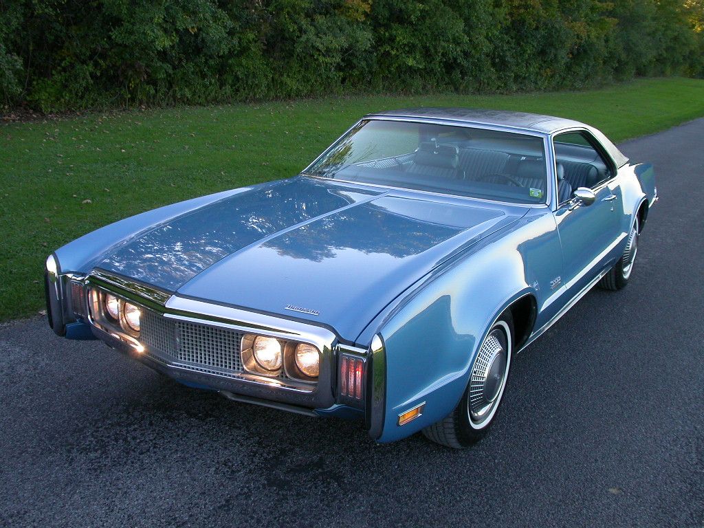 Американские машины 70. Oldsmobile Toronado 1970. Toronado Oldsmobile 70. Олдсмобиль Торнадо 1966. Олдсмобиль Торнадо 1971.