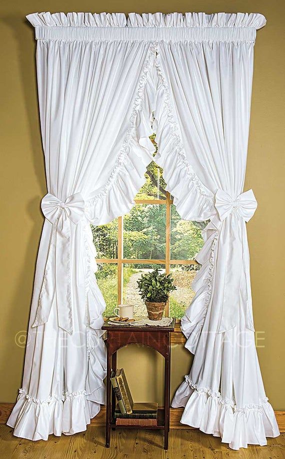 Beauty and quality is what you'll find in our cottage curtains. Made out of a 50%/50% cotton polyester blended material. Pre-tied bows are included. Available in Natural, White, or Mocha. Additional sizes are available for special order please call (800) 235-4088.COLORWhite or NaturalSIZE(100"Wide is approximately 50" PER PANEL, containing 2 (two) panels of 50" W equaling 100"W across!)CARE INSTRUCTIONS: *Highly recommend dry clean* or machine wash, tumble dry low.NO REFUNDS OR EXCHANGES ON 300" Ruffle Curtains, Cute Curtains, Shabby Chic Curtains, Beautiful Curtains, Cortinas Shabby Chic, Rideaux Shabby Chic, Cottage Curtains, Country Curtains