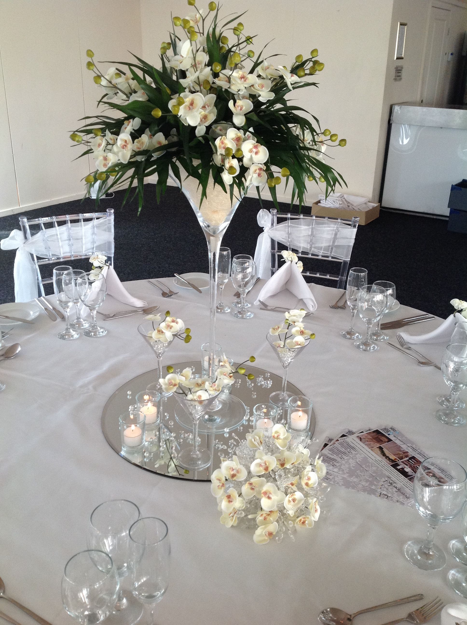 Mirror Tiles For Table Decorations Glamorous Floral Arrangement Set In A Martini Glass On Mirror Tile Base With Inspiration Design Mirror Tiles For Table Decorations Endearing Floral Arrangement Set In A Martini Glass On Mirror Tile Base With Decorating Design