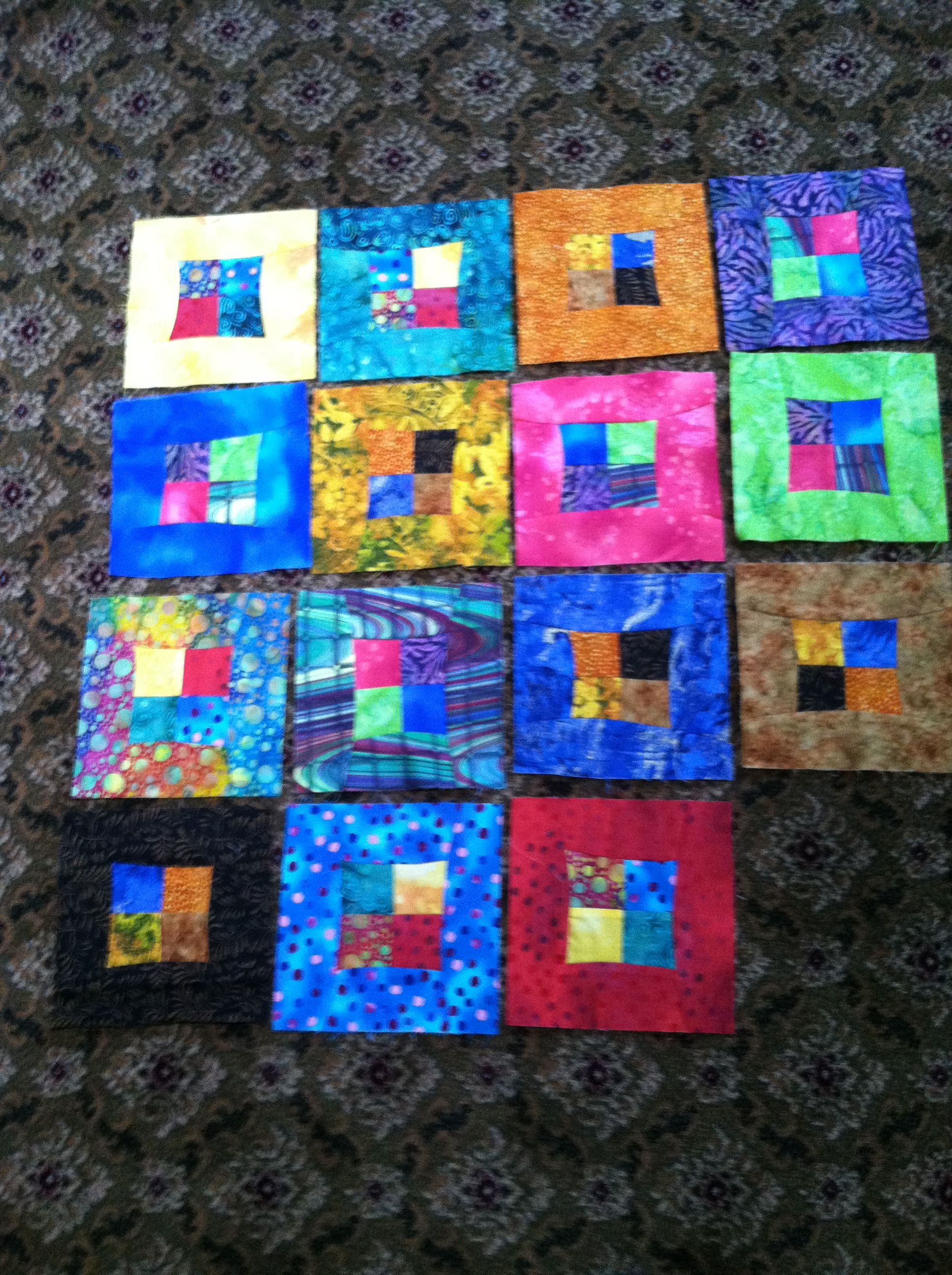 Stack the deck in batiks. Didn't realize how much blue I have. There are probably another 15 that need seem. Maybe a all hanging.
