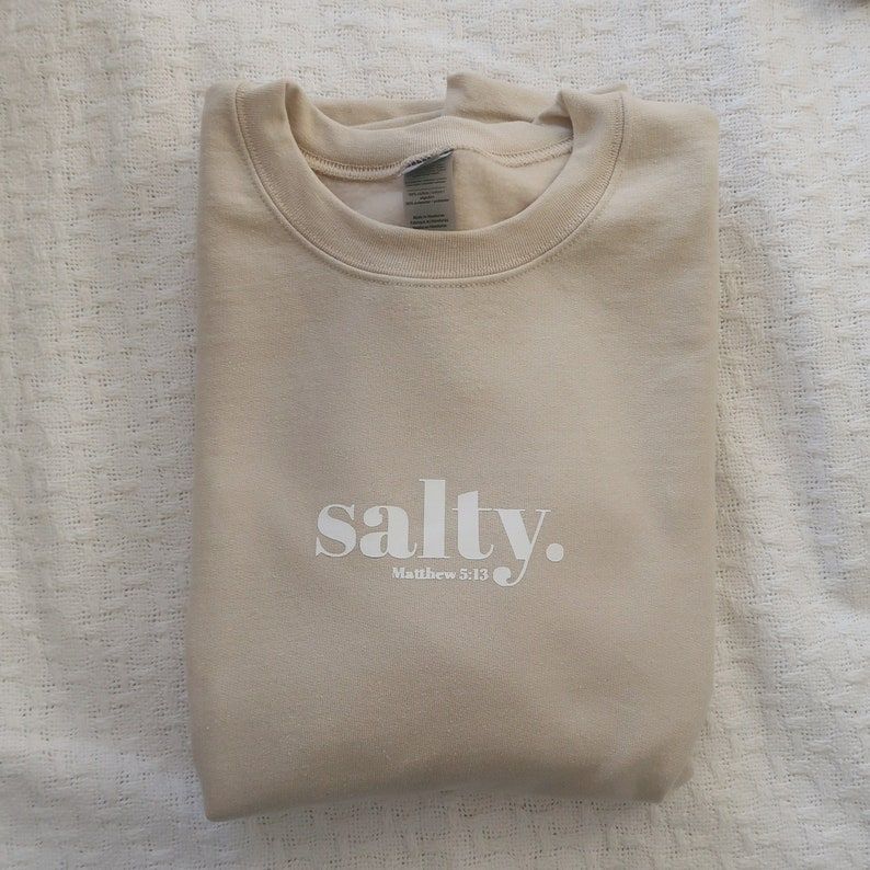 Salty Crewneck Christian Hoodie Christian Clothing Faith | Etsy Christian Tees, Christian Apparel, Cute Christian Outfits, Christian Clothing Brands, Sup Yoga, Cute Shirt Designs, Apparel Design, Tee Design, Swagg