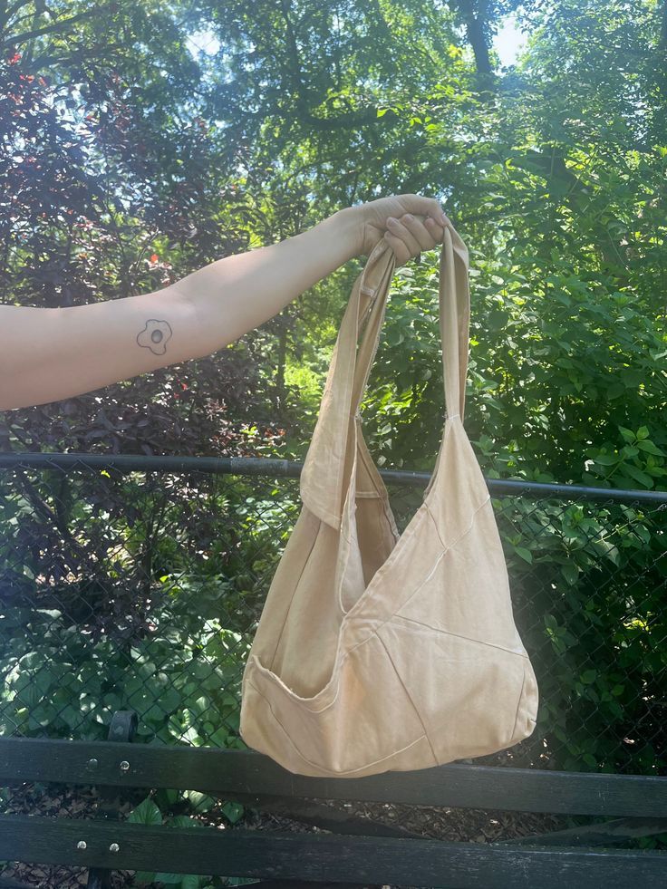 Adjustable tie strap multi-wear patchwork messenger bag to become your new emotional support tote bag. Hand sewn and dyed in our NYC studio out of leftover fabric from other projects as part of our zero waste initiative. Grocery Market, Messenger Tote, Nyc Studio, Leftover Fabric, Overnight Bag, Triangle Shape, Sustainable Fashion, Companion, Hand Sewing