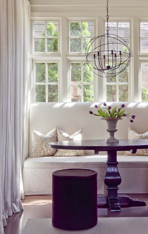 Featured on Linda Merrill's blog Surroundings: Do's and Don'ts of Dining Banquettes and Settees dining area orb pendant white drapery white dining banquettes settees Settee Dining, Dining Banquette, Dining Nook, Dining Furniture, Corner Banquette, Dining Chairs, Dining Table, Kitchen Chairs, Room Chairs