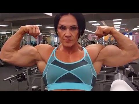 female sexy mature biceps flexing Female sexy mature biceps flexing