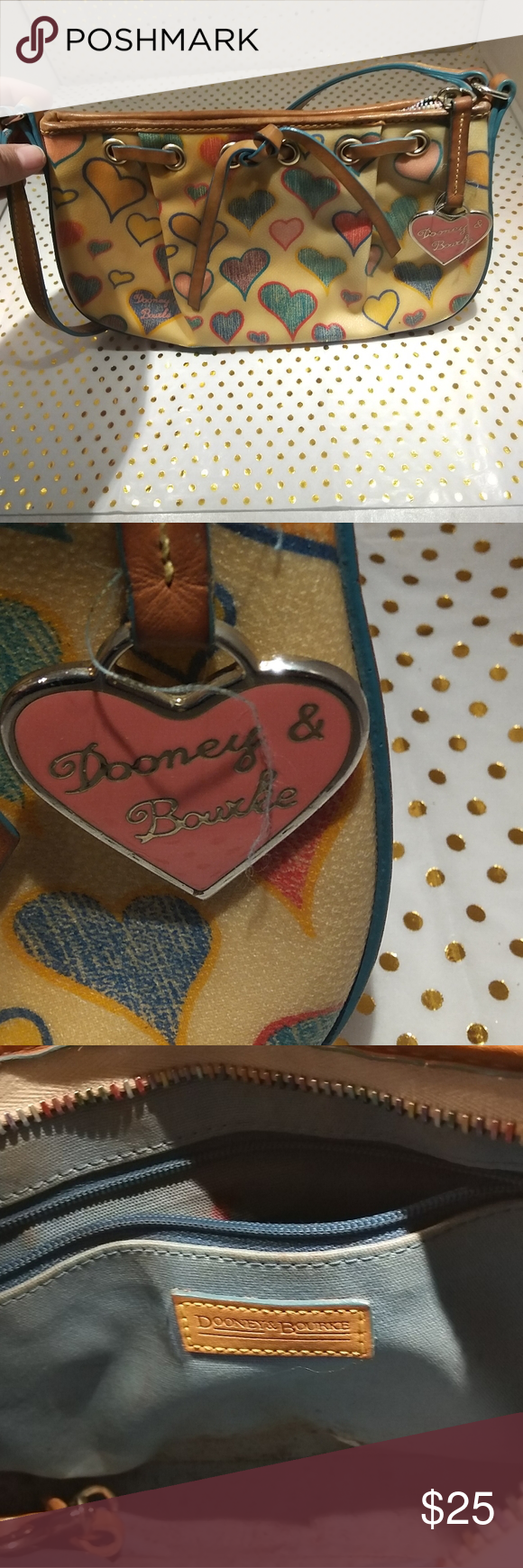 Dooney & Bourke shoulder bag with rainbow hearts. Over the shoulder vintage shoulder bag with crayon heart shaped print. Light blue interior. Early 2000. Has some make up stains on inside possibly eyeshadow?? Outside is in great shape. Inside has no tears or rips. Dooney & Bourke Bags Shoulder Bags #crayonheart Dooney & Bourke shoulder bag with rainbow hearts. Over the shoulder vintage shoulder bag with crayon heart shaped print. Light blue interior. Early 2000. Has some make up stains on inside #crayonheart