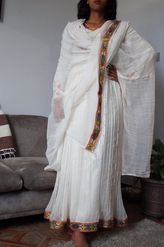 This Womens Dresses item by LiyaWear has 89 favorites from Etsy shoppers. Ships from Ethiopia. Listed on Apr 15, 2022 Ethiopian Wedding Dress, Ethiopian Dress, Ethiopian Traditional Dress, Traditional Dresses, Chiffon Dress Long Casual, Casual Dresses, Womens Dresses, Ancient Egyptian Dress, Classic Fashion Looks
