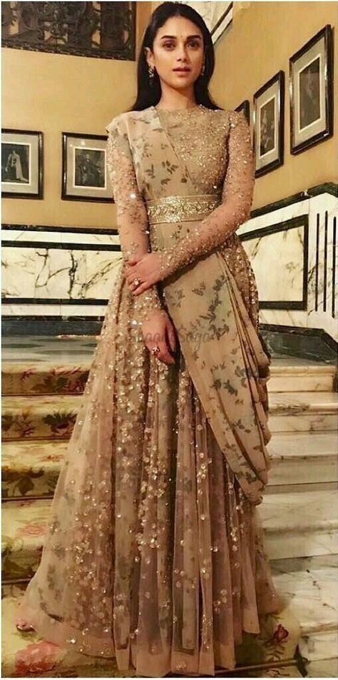 Beautifully embroidered gown perfect for your wedding functions. #bridalgown #metallicgown #weddingwear #weddingoutfit #bridaloutfit #bridalwear #brides2020 #elegantgown #shaadisaga Indian Wedding Gowns, Indian Gowns Dresses, Indian Wedding Outfits, Indian Fashion Dresses, Indian Outfits, Dress Wedding, Backless Wedding, Saree Dress Gowns Ideas, Engagement Dress For Bride Indian Gown