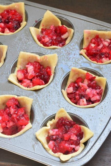 Cranberry Brie Puff Bites. These cranberry brie puffs are made with fresh cranberries, apple, and nutmeg filling, gooey Brie cheese, and all stuffed inside a flaky puff pastry. #cranberry #appetizer #snack #apple #brie #puffs #bites #puffpastry #cranberrybriebites Cranberry Brie Puff Bites. These cranberry brie puffs are made with fresh cranberries, apple, and nutmeg filling, gooey Brie cheese, and all stuffed inside a flaky puff pastry. #cranberry #appetizer #snack #apple #brie #puffs #bites #p #cranberrybriebites
