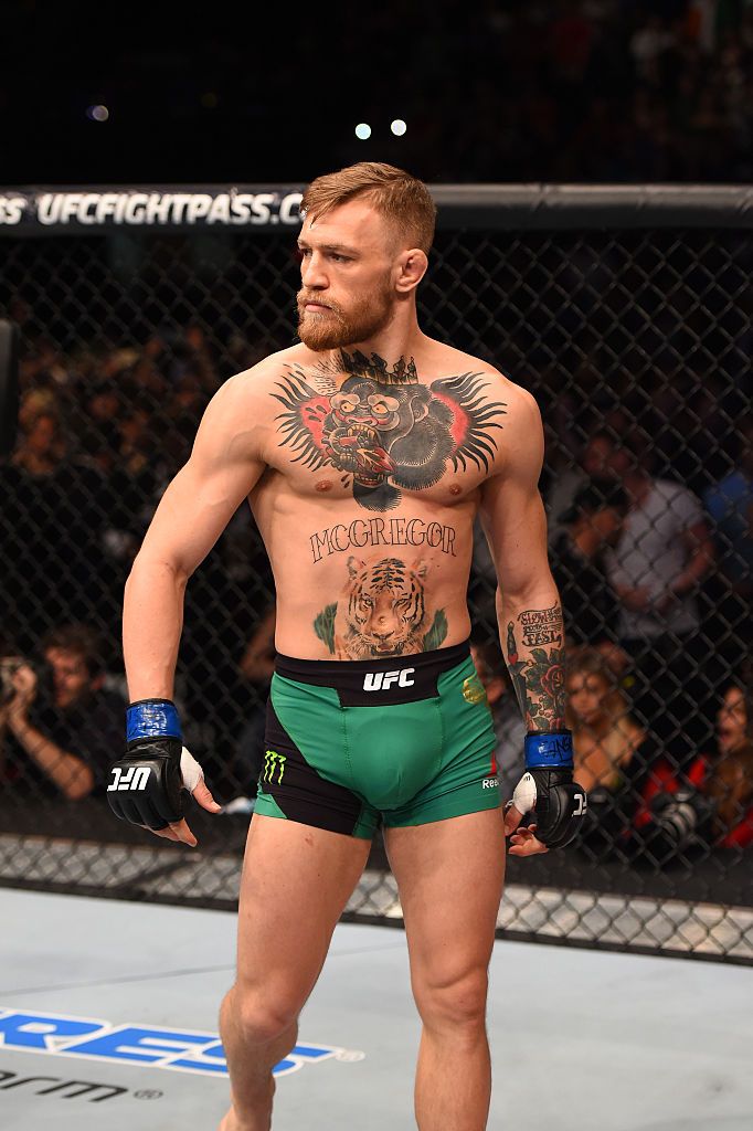 LAS VEGAS, NV - DECEMBER 12: Conor McGregor of Ireland enters the Octagon before his UFC welterweight championship bout against Jose Aldo during the UFC 194 event inside MGM Grand Garden Arena on December 12, 2015 in Las Vegas, Nevada. (Photo by Josh Hedges/Zuffa LLC/Zuffa LLC via Getty Images) Connor Mcgregor, Conor Mcgregor Style, Ufc Conor Mcgregor, Conor Mcgregor Wallpaper, Mcgregor Wallpapers, Notorious Conor Mcgregor, Notorious Mma, Ufc Boxing, Ufc News