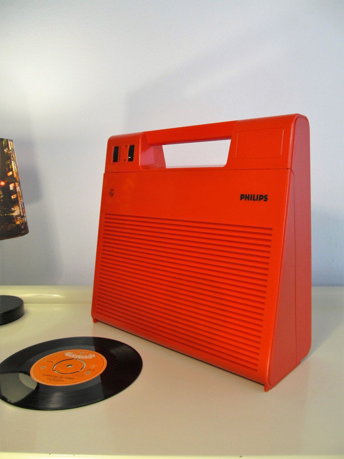 a record rotates on a turntable at 33 rpm. a record rotates on a turntable at 33 rpm.