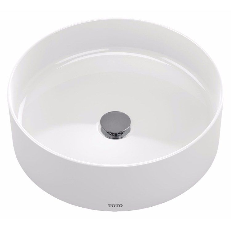 Neutral And Blush Tones Paired With A Toto Vessel Sink Create A