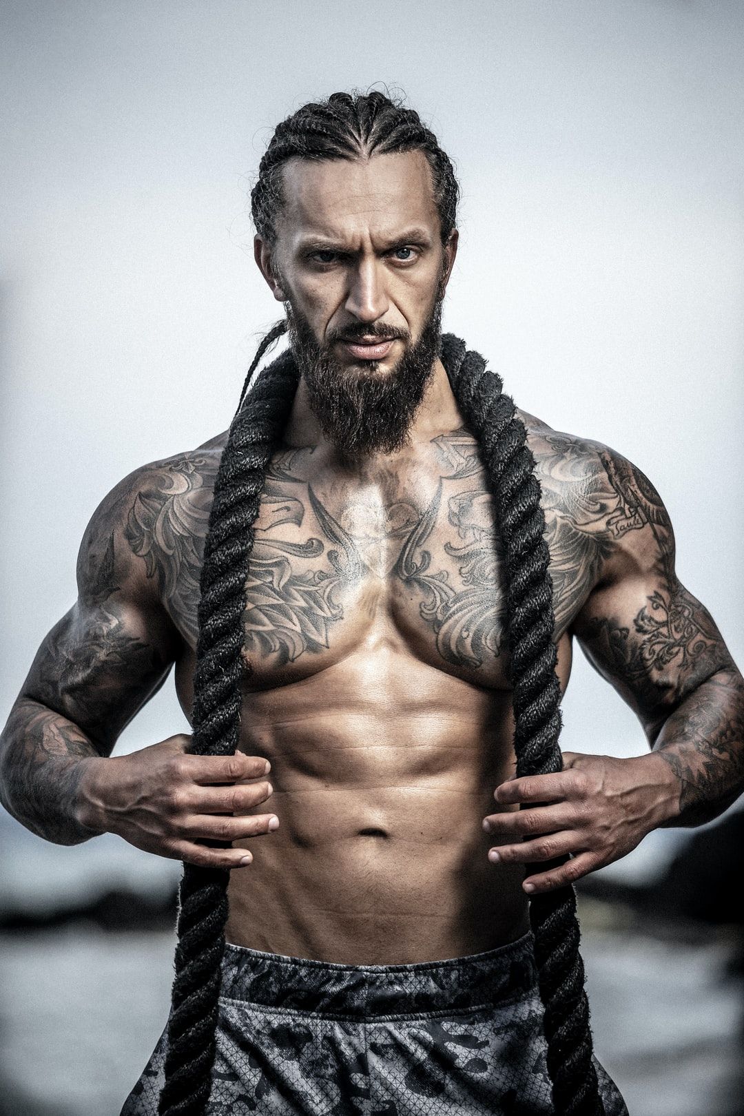 Fitness Model With Tattoos And A Rope Around His Neck Download This Photo By Oto Winkler On