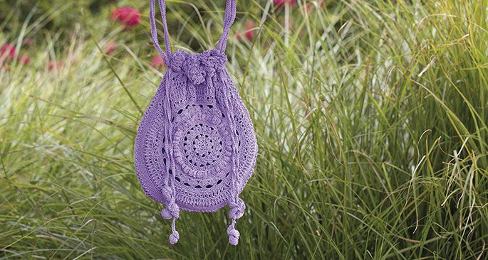 Passion for Purple hand crochet bag pattern. Crochet this hippy chic round crochet bag! SIZE: 10″ width x 11″ height MATE IALS: • #10 cotton crochet thread (shown in Wood Violet), 2 skeins of 350 yd. skein C OCHET HOOK: Size E (3.5 mm) or size needed to obtain gauge GAUGE: 2.5″ x 2.5″ square = 7 rows of 17 tr Free pattern More Patterns Like This! Grannies Crochet, One Skein Crochet, Crochet Tote, Crochet Bag Pattern, Cotton Crochet, Thread Crochet, Learn To Crochet, Hand Crochet, Crochet Patterns