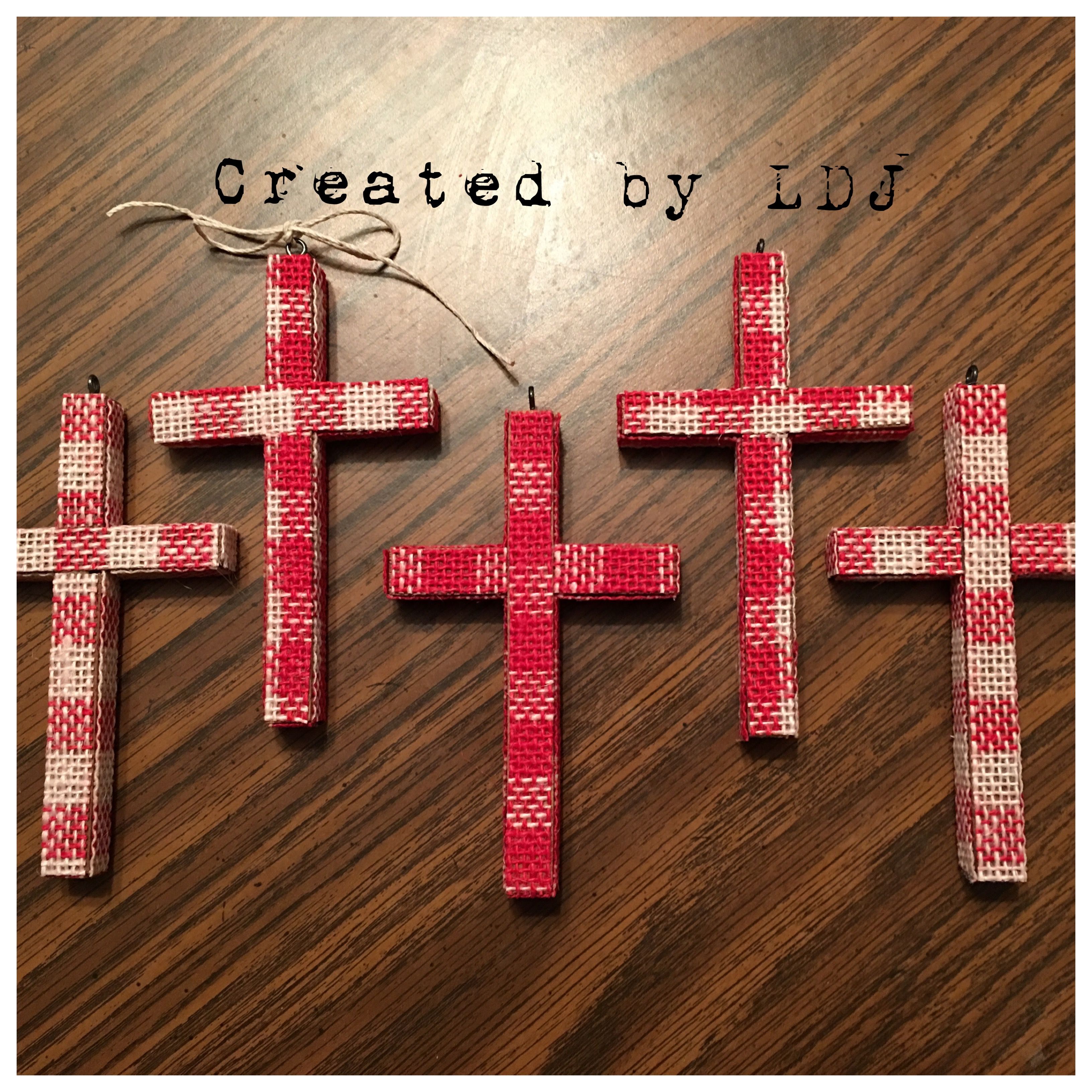 Holy Cross Christmas Craft Fair 2023 Wooden cross ornaments covered in red plaid burlap ribbon. Christmas