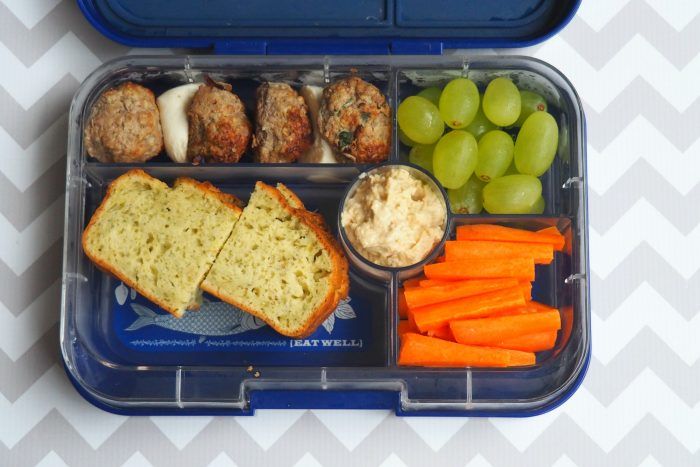 easy and healthy lunch box ideas for grown ups meal prep chicken and pesto meatballs bococinni balls pesto and cheddar loaf hummus carrot sticks and grapes