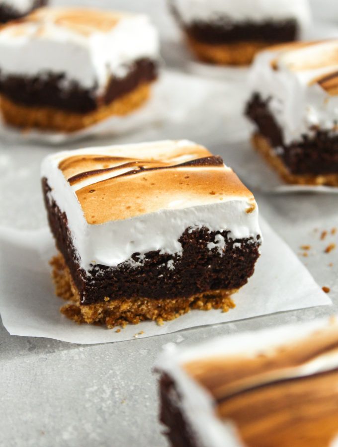 Delicious layers of graham cracker crust, fudgy brownie and toasted meringue make the perfect s'more brownies. These bars can be served year around for a delicious treat. #smores #fudgybrownies #toastedmeringue #homemadegrahamcrackercrust Delicious layers of graham cracker crust, fudgy brownie and toasted meringue make the perfect s'more brownies. These bars can be served year around for a delicious treat. #smores #fudgybrownies #toastedmeringue #homemadegrahamcrackercrust