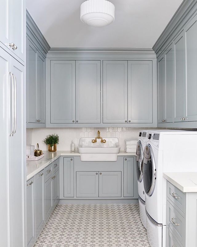 The majority of our clients are growing families - and functionality is always my top priority. This pretty laundry room we designed has… Laundry Room/mudroom, Laundry Room Tile, Blue Laundry Rooms, Dream Laundry Room, Laundry Room Layouts, Laundry Room Cabinets, Laundry Room Remodel, Room Tiles, Laundry Room Makeover