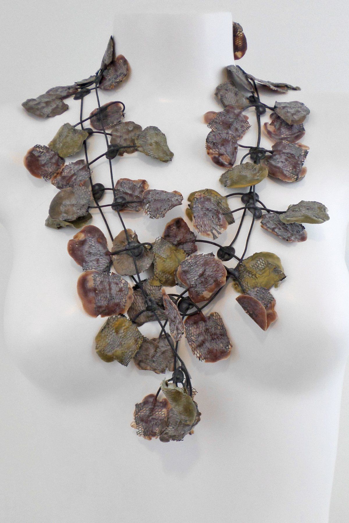 Material: Rubber & elastic. Description: Artisan necklace made from rubber overlayed with lace to form flower petals, looking almost wilted, dangling from stems. Due to the hand-made nature of this product, variations in color and detail along with some air bubbles are to be expected and are not considered flaws. Dimensions: Approximately 59" long with a 28" drop, 14" drop when doubled. About the artist: Annemieke Broenink is a Dutch designer with a passion for fashion and accessories. She s Poppy Necklace, Lace Necklace, Amsterdam Fashion, Artisan Necklace, Sculptural Fashion, Organic Form, Study Style, Poppy Flower, Flower Petals