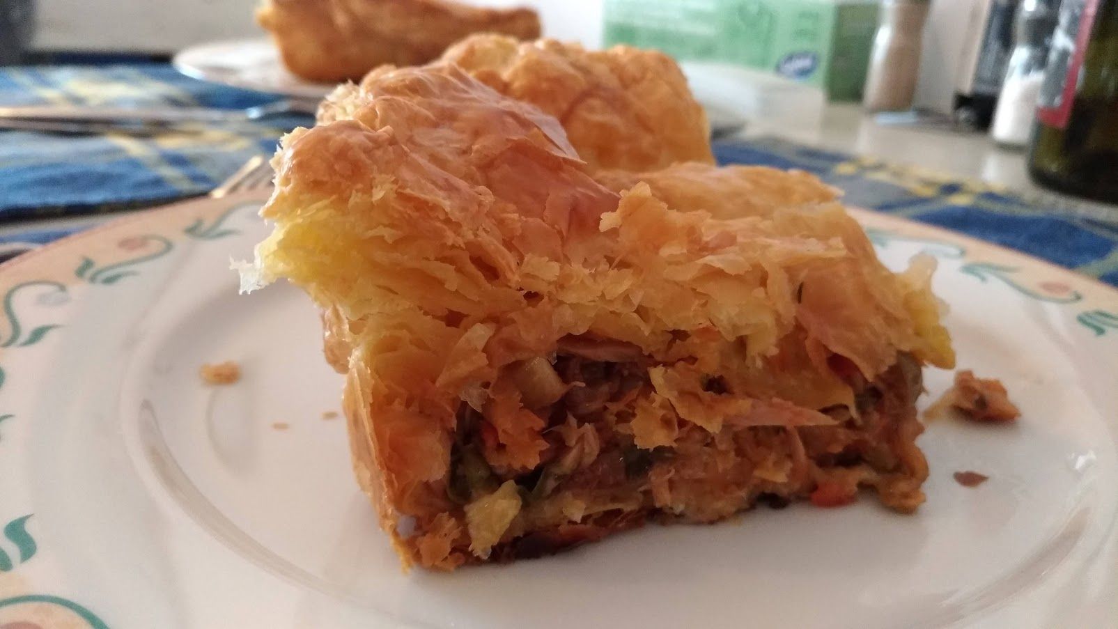 Sweet & Spicy Tuna Pie: Not your Mother's tuna casserole! Remember tuna casserole? That pie with goopy white sauce, noodles and canned tuna, probably topped with crushed potato chips? I am blessed that my mother never made it, but I certainly had it at friends’ homes and the school cafeteria. Now, put your preconceptions aside and give this tuna recipe a try. It may seem like a basic tuna and veggie casserole, but it springs to life in your mouth with a twist of spicy (from the chili peppers), Frozen Puff Pastry, Puff Pastry Sheets, Tuna Pie, Pastry Cook, Veggie Casserole, Simple Green Salad, Onion Relish, Spicy Tuna, School Cafeteria