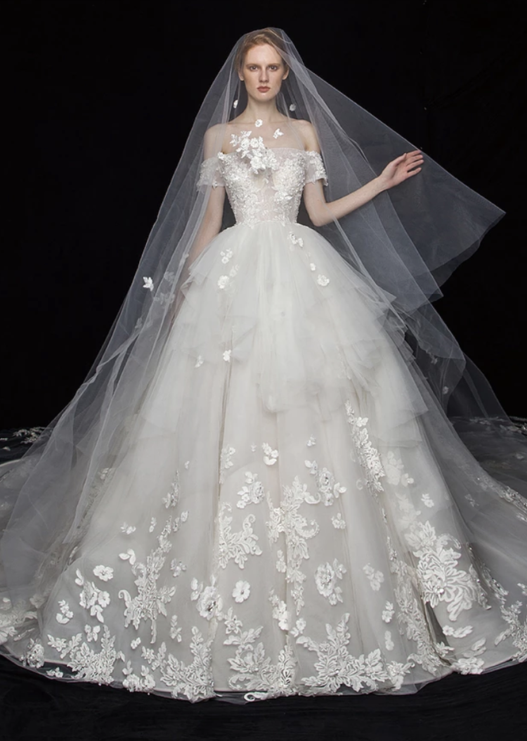 This glamorous wedding gown from S.eri Wedding Dress featuring floral