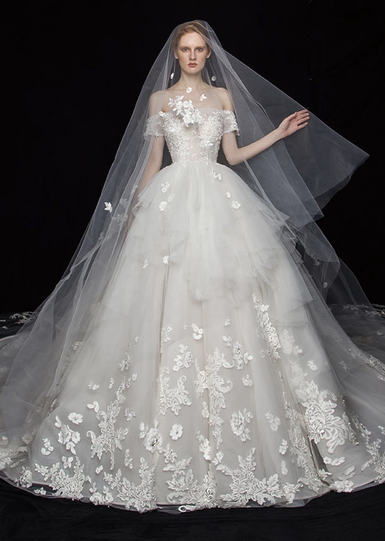 This glamorous wedding gown from S.eri Wedding Dress featuring floral ...