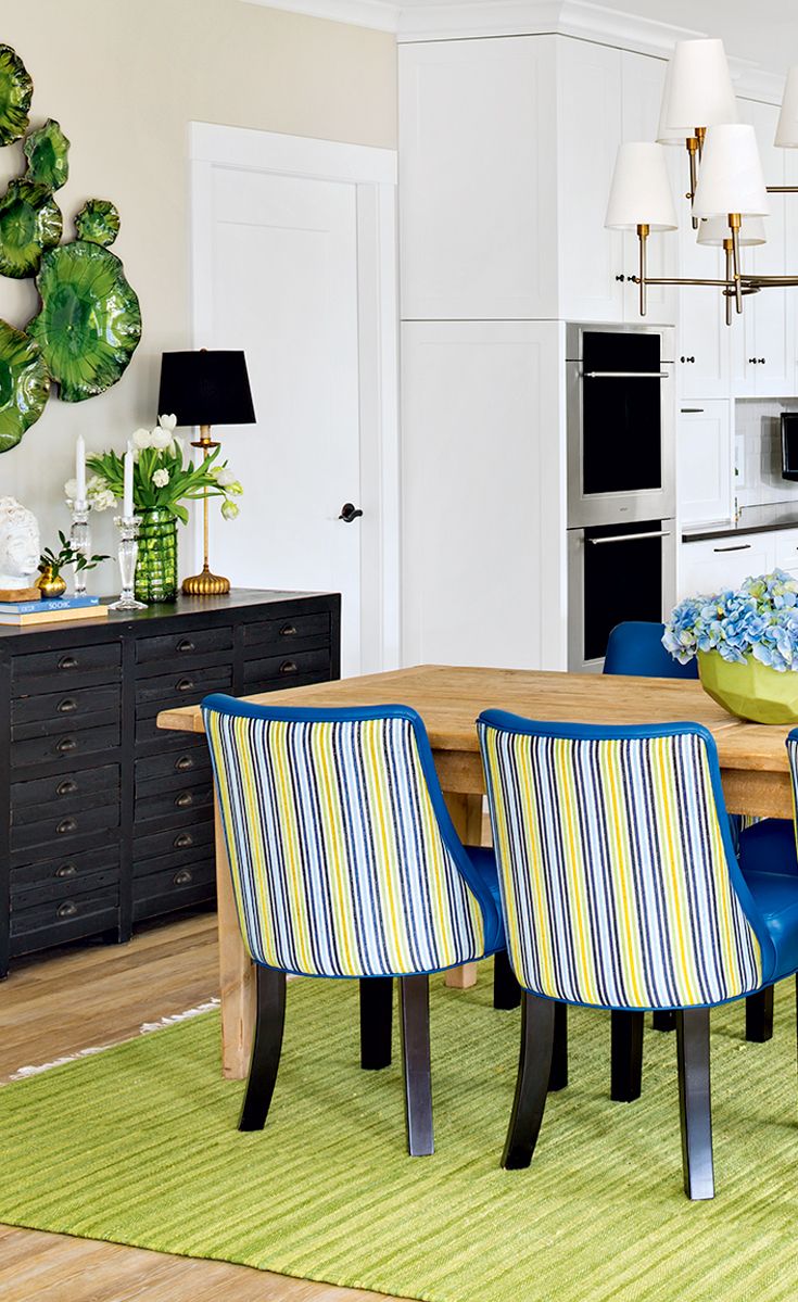 A family home with splashed with vibrant green and blue hues | Canadian