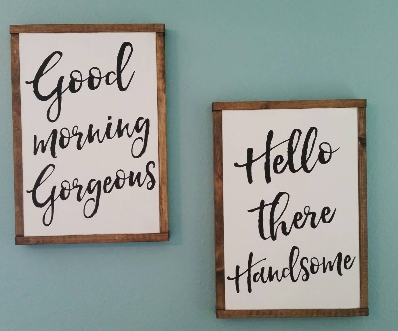 two wooden signs that say good morning gorgeous and hello handsome