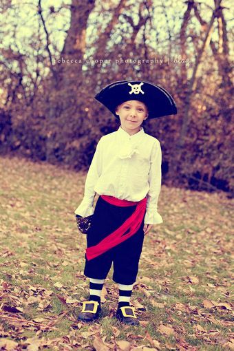 a pirate costume #diypiratecostumeforkids using craft foam cut out two yellow/gold rectangles, cut out two smaller rectangles out of black and adhere to the yellow rectangles to make buckles. attach to a pair of black dress shoes #diypiratecostumeforkids