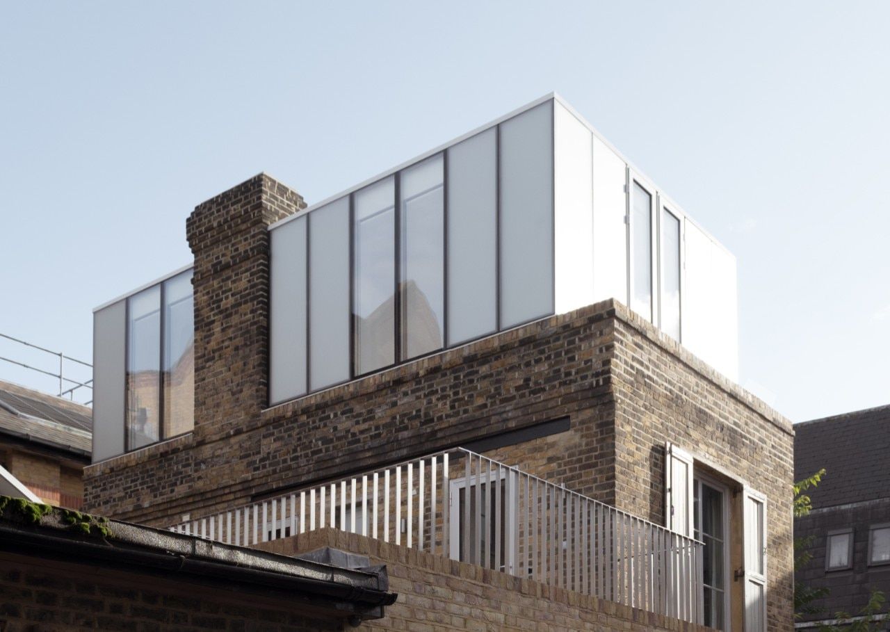Brick and glass extensions convert a Victorian bakery into a London home