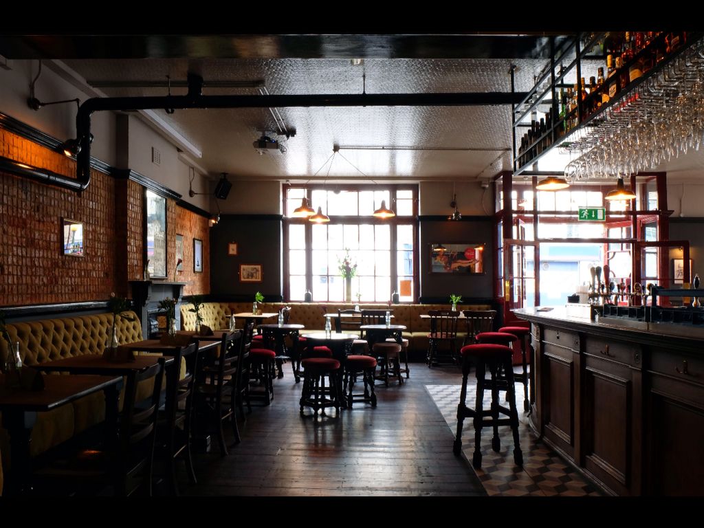 Down stairs pub. slightly less traditional / more urban