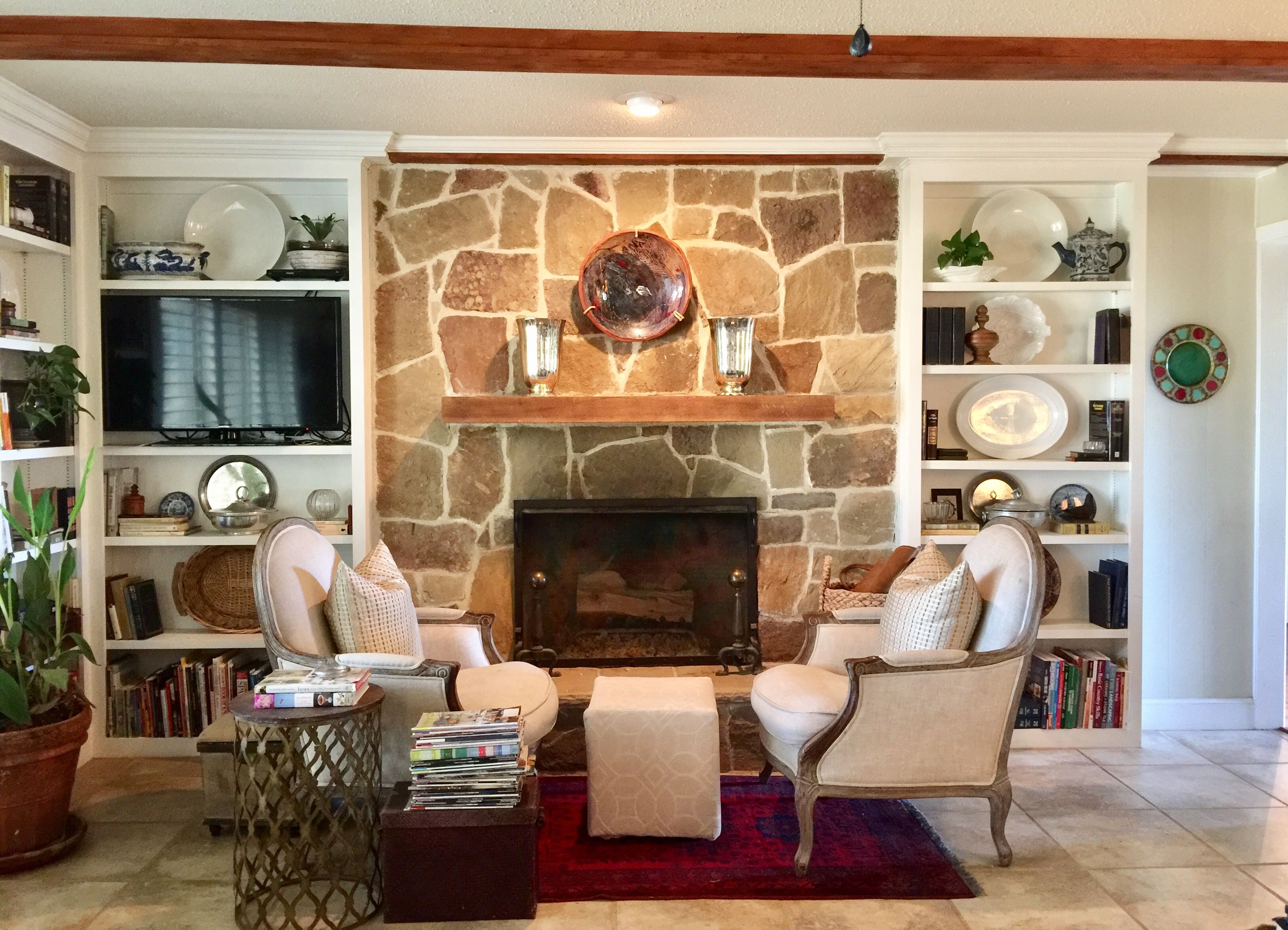 Furniture Layout Ideas in Front of Stone Fireplace. Makes for a cozy